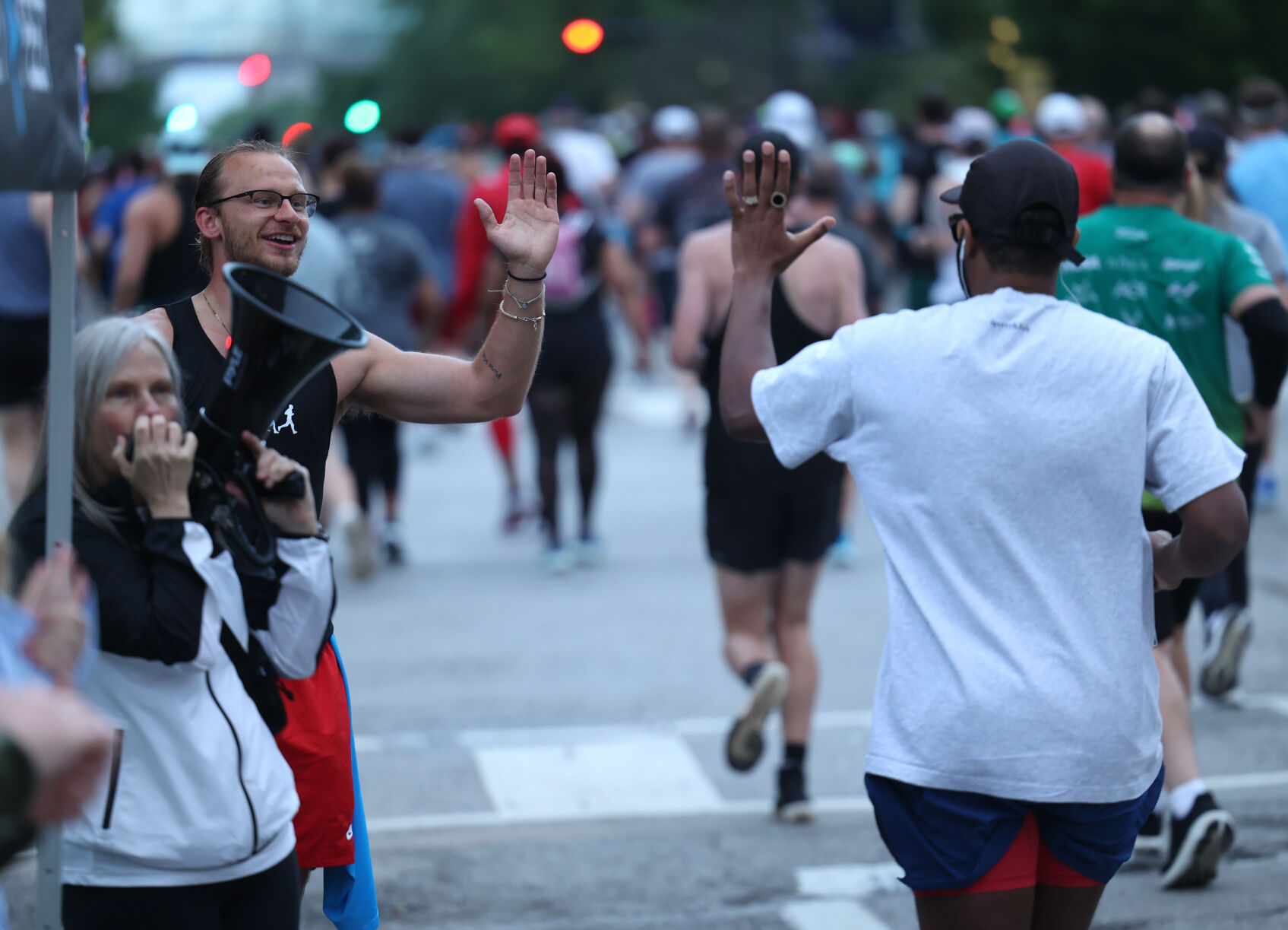 Supporter gives a high five.JPG